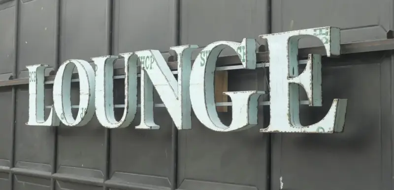 Product image of the product “Capital Letters - LOUNGE on metal frame Height about 50cm. white color letter. ”